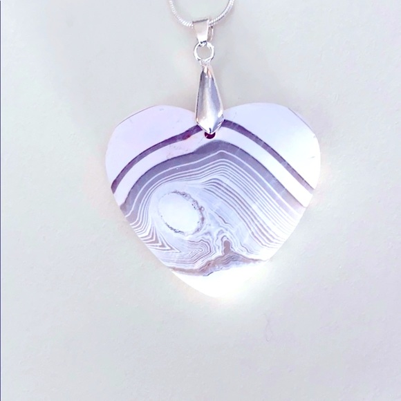 Jewelry - A heart shaped pendant necklace